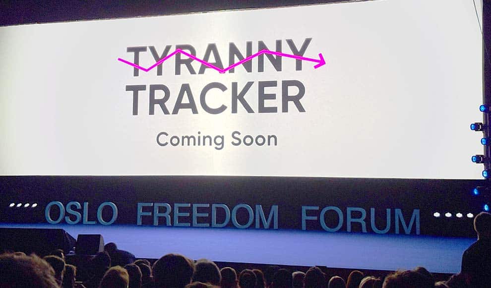 Presentation slide showing 'Tyranny Tracker Coming Soon' at Oslo Freedom Forum event