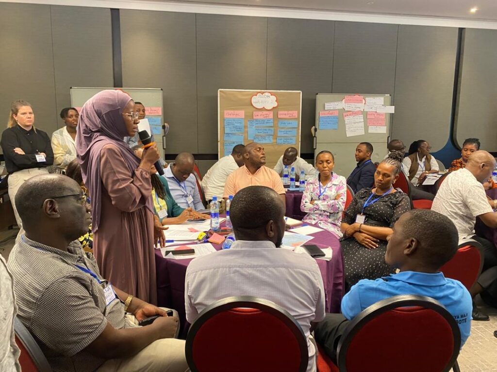 Participants in a training session discussing water stewardship in Tanzania